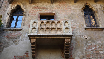 Fototapeta na wymiar Balcony in the house of the legendary Shakespeare's Juliet in Verona, Italy