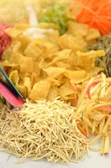 A special dish during Chinese New Year called Yusheng or Yee Sang..