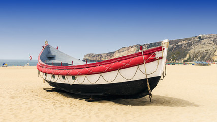 Boat on the beach in Nazare in Portugal