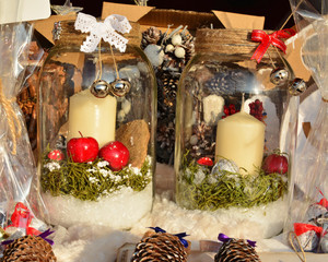 Christmas decorations with candles, apples, bells