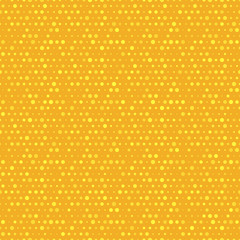 Orange and yellow dotted vector seamless pattern.