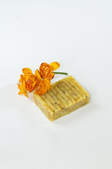 Handmade natural soaps with the scents of calendula, cucumber and carrot. On black or white background. Isolated.