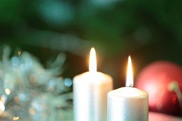 Obraz na płótnie Canvas candle with Christmas ornaments 