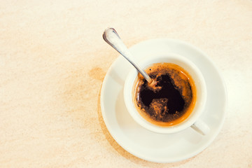 Cup of coffee on wood background with copyspace