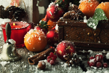 Fototapeta na wymiar Mandarin and Christmas tree with snow