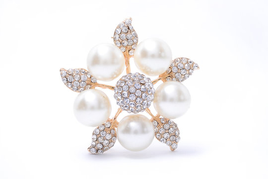 Flower Brooch with pearls isolated on white