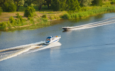 Obraz premium Two motor boats