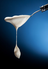 Spoon with yogurt
