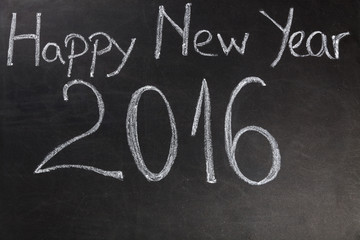 Happy New Year 2016 written with chalk on blackboard