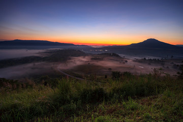 Fototapeta na wymiar Misty morning sunrise in Khao Takhian Ngo View Point at Khao-kho