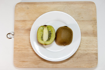 kiwi fruit isolated on block and white dish decoration decoratio