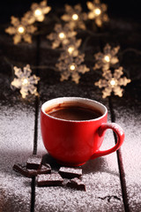 Hot chocolate and chocolate pieces.