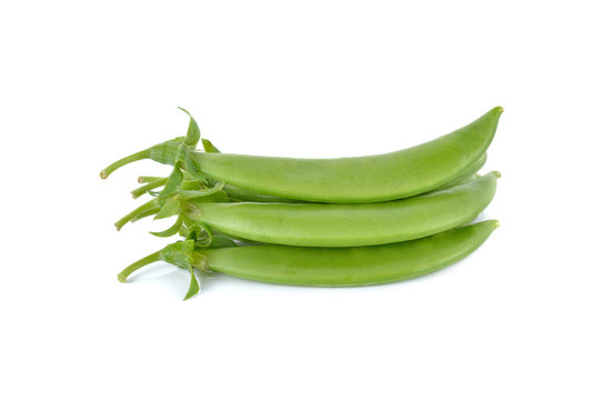 fresh green peas with stem on white background