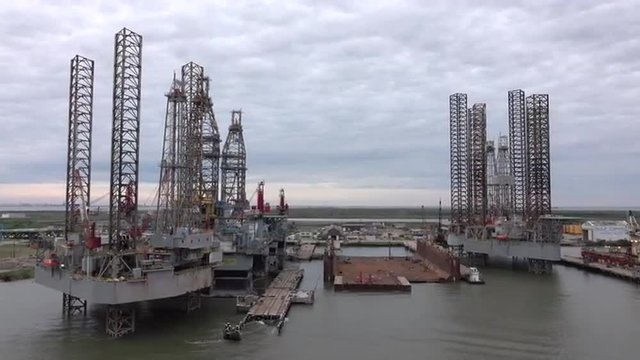 Galveston Texas off shore oil platforms port industry fast. Offshore platform oil rig structure with living and industrial facilities. Extract and process oil and natural gas, and to store product.