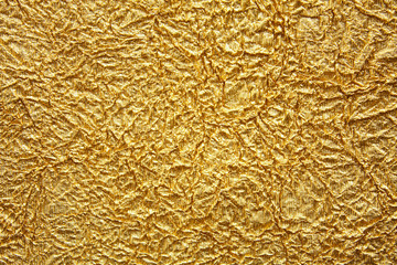 Shiny gold texture crumpled background