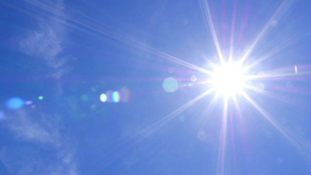 Blue Sky and Sun with Lens Flare