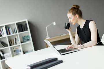 Young woman working in the office