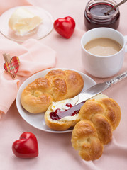 Delicious breakfast with a nice cup of coffee, fresh braided bre