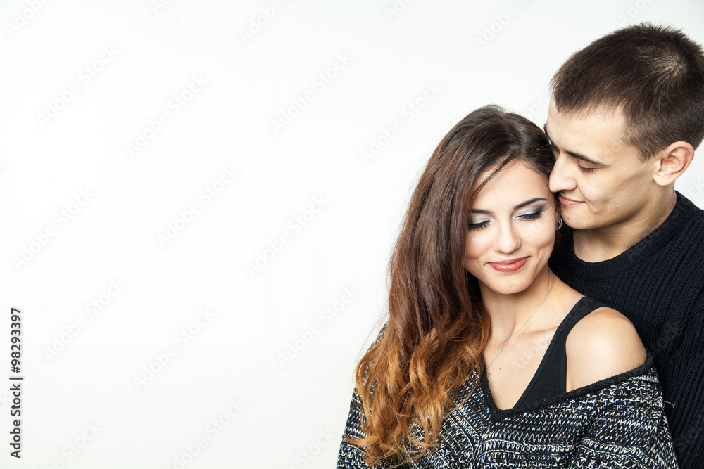 Wall mural beautiful young couple isolated on white background