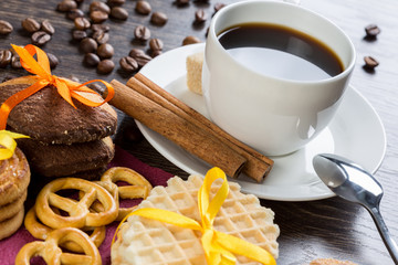 Biscuits and coffee on table