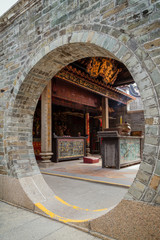 Round doorway at the Pak Tai Temple on Cheung Chau Island in Hong Kong, China.