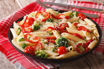 Primavera Italian pasta with vegetables close-up 
