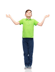 Fototapeta premium happy boy in polo t-shirt raising hands up