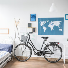 Urban bike standing in designed teenager room