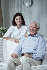 Obraz premium Happy elderly man with granddaughter