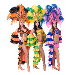 Naklejka premium dancer team wearing carnival costumes dancing