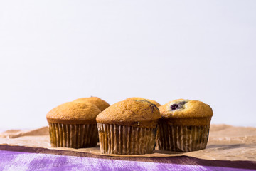 Muffins on the wooden table