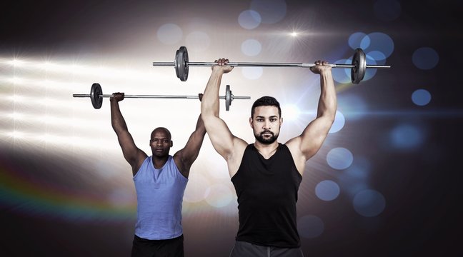 Composite image of man lifting barbell with trainer