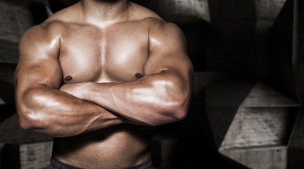 Composite image of a bodybuilder man with arms crossed