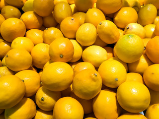 Group Of Lemons In Market
