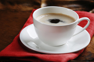 Cup of coffee on table close up