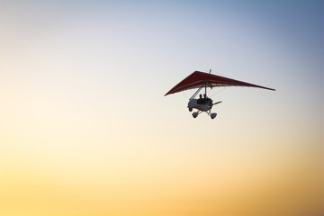 The motorized hang glider in the sky