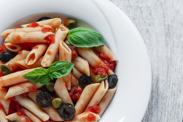 pasta with tomato sauce olives and capers