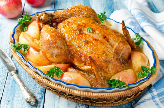 Whole roasted chicken with apples and cream sauce