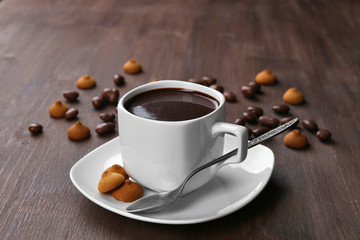 Cacao with biscuits on wooden background