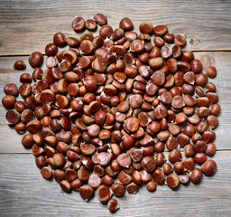 Fresh chestnut on wooden table