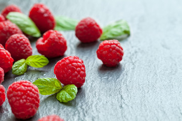 Heap of raspberry on stone