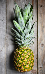 Pineapple on wooden table