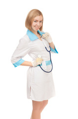 Woman doctor in white lab coat standing on white background.