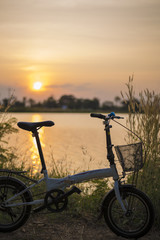 Bicycle Silhouette sunset on river