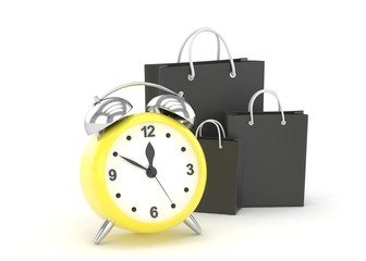 alarm clock and shopping bag (time to buy concept)