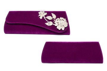 purple clutch with diamond flower on a white background
