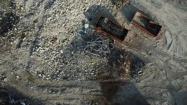 Aerial drone shot of an industrial construction yard.
