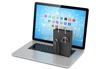 laptop and  shopping pags on white background