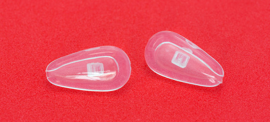 Silicone screw in nose pads for eyeglasses