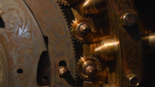 Slow panning of vault door with cogs